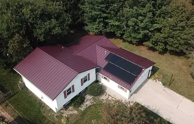 Maroon Roof With Solar Panel